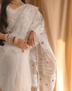 Pure soft Off-white silk organza saree with Lucknowi & silver zari touch up embroidered all over saree with tassels (zalar)  in pallu border contrast silk matching blouse Luxury Organza Saree With Lace Work, Luxury Chikankari Embroidery Saree For Celebration, Luxury Off White Chikankari Saree, Luxury Slub Silk Saree With Chikankari Embroidery, Luxury Chikankari Embroidered Slub Silk Saree, Luxury Saree With Chikankari Embroidery, Luxury Chikankari Embroidery Saree For Transitional Season, Luxury Chikankari Embroidered Saree, Luxury Chikankari Pre-draped Saree For Party