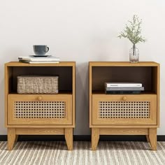 two wooden nightstands with wicker baskets on each side and a coffee cup sitting on top