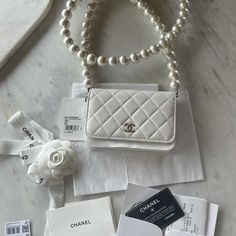 New With Tag Luxury White Bags With Pearl Handle, Elegant Everyday Luxury Wallet On Chain Clutch, Elegant Clutch Wallet On Chain, Elegant Clutch Style Wallet On Chain, Elegant Wallet On Chain Styled As A Clutch, Classic Bag With Pearl Handle And Rectangular Shape, Classic Rectangular Bag With Pearl Handle, Luxury White Bags With Chain Strap, Luxury White Wallet On Chain