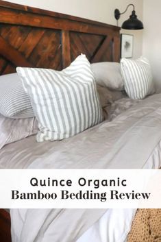 an image of a bed with pillows on top of it and the words quince organic bamboo bedding review