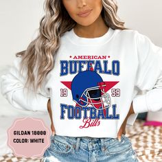 Show your team pride with this amazing Buffalo Bills Football Crewneck! Perfect for cooler days and game nights, this crewneck sweatshirt combines comfort and style, making it a must-have for any Bills fan. Available in a range of sizes, this crewneck offers a great fit for fans of all ages. Its versatile design makes it perfect for layering over your favorite game day outfit or wearing casually. Treat yourself or surprise a fellow Bills fan with this essential addition to their wardrobe. Get re Vintage Buffalo Bills, Football Crewneck, Buffalo Bills Football, Bills Football, Josh Allen, Nfl Buffalo Bills, Game Nights, Gameday Outfit, Buffalo Bills