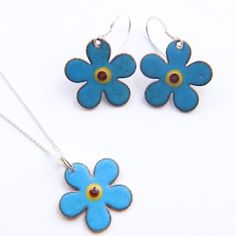 Blue Sterling Silver Necklace With Flower Charm, Blue Hypoallergenic Enamel Jewelry, Blue Enamel Hypoallergenic Jewelry, Hypoallergenic Blue Enamel Jewelry, Blue Hypoallergenic Jewelry For Mother's Day, Blue Flower-shaped Jewelry With Flower Charm, Light Blue Flower-shaped Jewelry For Gifts, Silver Enamel Jewelry For Mother's Day, Blue Sterling Silver Birth Flower Jewelry