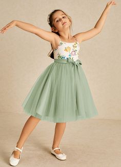 Jollie features a delightful A-line silhouette crafted from matte satin and tulle. Its square neckline and delicate spaghetti straps are accentuated by charming bows, combining playful elegance for a picture-perfect look. Sage Flower Girl Dress, Dusty Sage, Tulle Flower Girl, Flower Girl Dresses Tulle, Dress Dusty, Matte Satin, Silhouette Crafts, A Princess, Girl Dresses