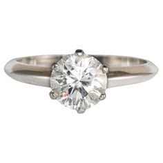 Ladies Tiffany & Co diamond solitaire ring with platinum settings. The inside of the ring is stamped Tiffany & Co Pt 950, 1.03, D24101. The gross ring weight is 2.4 grams. The 1.03-carat round brilliant diamond is graded by GIA, report number 2235084799. The color is F, Vs1 clarity, and the cut grade is very good. The diamond is very brilliant. Ring size is 5 1/4 and can be sized down to a 5 or up to a maximum of 6 1/2 for an extra fee. Like new condition. Comes with a full GIA grading certifica Tiffany And Co Diamond, Tiffany Ring, Brilliant Ring, Tiffany Rings, Diamond Solitaire Ring, Tiffany And Co, Diamond Solitaire Rings, Brilliant Diamond, Ring Box