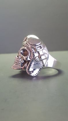 Sterling Silver Aviator Skull Ring Unique Silver Skull Ring Collectible, Collectible Sterling Silver Skull Ring With Polished Finish, Adjustable Silver Skull Ring Collectible, Biker Skull Jewelry For Gift, Biker Style Skull Jewelry Gift, Biker Style Skull Jewelry For Gift, Silver Skull Biker Jewelry, Vintage Silver Skull Ring For Biker Events, Biker Silver Skull Jewelry