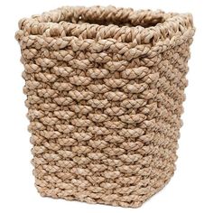 a woven basket is shown on a white surface with the handles down and there are no people around it