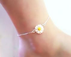 "Pretty little Daisy Anklet or Bracelet. The daisy is handcrafted to a 12mm size. The flower is along a delicate cable chain in a choice of 925 sterling silver or 14k gold filled.Choose from S-M-L-XL length. The Daisy is April's birth flower and a great gift idea for those with an April birthday. -Flower Size : 12mm -Chain : Choose 925 sterling silver or 14k gold filled cable chain View matching collection at: https://www.etsy.com/shop/strandedtreasures/search?search_query=daisy MEASURING GUIDE Adjustable Anklets For Spring Gift, White Daisy Bracelets As Gift, Summer Gift Jewelry With Flower Decoration, Summer Flower Decoration Jewelry Gift, Flower Shaped Anklets For Spring Gift, Delicate White Anklet As A Gift, Flower Anklets For Spring, Perfect As A Gift, Spring Flower Anklets, Dainty White Anklet Suitable For Gift