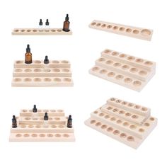 four wooden pegs with bottles on them and one is filled with essential oils, the other two are empty