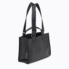 This must have style is a roomy structured version of the classic Bedford Tote! Details Imported leather Gunmetal hardware Magnetic snap closure 2 front slip pockets 1 interior zip pocket, 2 slip pockets and 3 card slots Metallic foil lining Measurements Height: 10 in (20 cm)Length: 13 in (25 cm)Depth: 5 in (12.5 cm)Handle Drop: 3 in (7.6 cm)Strap Drop: 12 in (30 cm) Leather Information The Bedford Structured Tote is made from pebble leather, which is a soft leather with a grainy texture that re Sleek Black Bag For Work, Sleek Black Workwear Bag, Classic Workwear Bags With Gunmetal Hardware, Modern Shoulder Bag With Gunmetal Hardware For Formal Occasions, Modern Shoulder Bag With Gunmetal Hardware For Formal Events, Modern Formal Shoulder Bag With Gunmetal Hardware, Black Business Bags With Metal Hardware, Sleek Business Bag With Metal Hardware, Versatile Shoulder Bag With Metal Hardware For Work