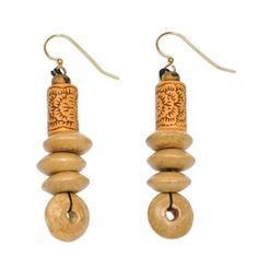 the earrings are made out of wooden beads