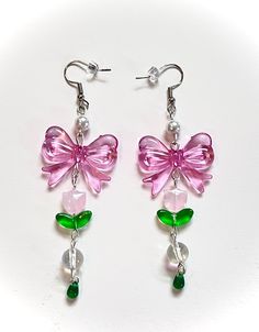 - pink tulip bow earrings  - as someone with sensitive ears, these are a little heavy but nothing intense - super dangly and fun - comes with backing <3 Pink Bow Earrings In Cute Style, Cute Pink Earrings With Pink Bow, Cute Pink Bow Jewelry, Cute Pink Jewelry With Bow, Earrings Design, Pink Tulips, Bow Earrings, Ann Arbor, Sensitive Ears