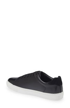 A classic low-profile sneaker with suede trim and a solid rubber outsole pairs perfectly with low-key, casual outfits. Leather upper/synthetic lining and sole Imported Flip Flop Slippers, Sneaker Men, Sweaters And Leggings, Fabric Gift Bags, Kids Boots, Low Key, Designer Sunglasses, Handbag Backpack