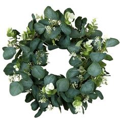 a wreath with green leaves and white flowers