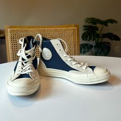 Never Worn White And Navy Blue Converse Chuck 70 High Tops! These Are In Perfect Condition, But Were Just The Wrong Size. Retro Blue Mid-top High-top Sneakers, Blue Converse Sporty High-top Sneakers, Sporty Blue Converse High-top Sneakers, Casual Navy High-top Sneakers With Rubber Sole, Blue Converse High-top Sneakers With Gum Sole, Retro Blue Sneakers With Laces, Blue Casual High-top Sneakers With Gum Sole, Casual Blue High-top Sneakers With Gum Sole, Casual Navy Converse Sneakers