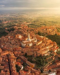 an aerial view of a city with lots of buildings