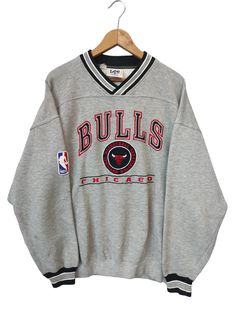 Vintage Chicago Bulls by Lee Sports NBA Cicago Bulls Jordan Vintage Chicago Bulls Sweatshirt Size XL STEP ON HOW TO OWN THIS ITEMS: ★★ Please read all the description carefully before make any purchasing. Somehow, if you have any questions feel free to ask. ★★ Please check and understand the measurements given as sizes vary by brand, and age of the garment. ★★ DETAILS : - Size on tag : X Large . (Please refer manual measurements given) Armpit to armpit : 26"inches Length from back Top collar to Chicago Bulls Shirt, Chicago Bulls Sweatshirt, Vintage Chicago Bulls, Bulls Shirt, Chicago Bulls, Vintage Sweatshirt, Nba, Jordan, Chicago