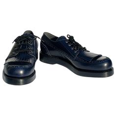 Gucci Men's Leather Fringed Brogue Lace-Up Shoes Dark Blue Gucci size 9 ( US 10 ) Mixing classic notes, such as brogueing and a hand-cut fringe, with unexpected touches, such as a stacked leather sole and metal loops, these lace-ups command attention. Navy blue color, Made of leather, Fringe detail, Goodyear construction. Thick leather sole (1-1 1/4" platform) New with box. Made in Italy. Retail $990.00 Listing code: 102354580081958 Gucci Men, Leather Fringe, Navy Blue Color, Lace Up Shoes, Leather Men, Clothing And Shoes, Dark Blue, Navy Blue, Lace Up