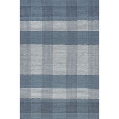 a blue and white plaid rug