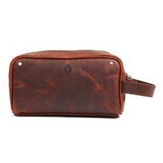 Our leather wash bags make the best men's gift for Christmas, birthday's and even weddings for your Best Man and Groomsmen. Handmade from the finest leather and ykk zipper they are durable and great for traveling the world or travel to and from the gym. Inside there is a waterproof lining and a zip pocket. Everyday Care Caring for your leather goods begins with daily maintenance. By adhering to a few simple guidelines, you can prevent unnecessary wear and tear and prolong the lifespan of your ac Travel Pouch With Zipper Closure, Everyday Leather Pouch With Luggage Sleeve, Functional Leather Rectangular Pouch, Leather Travel Pouch With Zipper Closure, Leather Travel Accessories With Zipper Closure, Rectangular Leather Travel Accessories With Zipper Closure, Functional Leather Bag Gift, Brown Pouch For Everyday Use, Functional Leather Bag As Gift