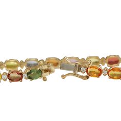 Stamped: 14K Yellow Gold Total Bracelet Weight: 9.6 Grams Bracelet Length: 7.5 Inches Bracelet Width: 4.35 mm Gemstone Weight: Total Natural Sapphire Weight is 12.03 Carat (6.00x4.00mm) Quantity: 20 Color: Multicolor Diamond Weight: Total Natural Diamond Weight is 0.71 Carat Quantity: 20 Color: F-G, Clarity: VS2-SI1 Face Measures: N/A Sku: [703087W] Elegant Multi-stone Oval Tennis Bracelet, Elegant Oval Multi-stone Tennis Bracelet, Heirloom Gold Multi-stone Bracelets, Heirloom Gold Bracelets With Multi-stone, Yellow Gold Multi-stone Oval Bracelet, Yellow Gold Multi-stone Oval Bracelets, Yellow Gold Oval Multi-stone Bracelet, Heirloom Yellow Gold Multi-stone Bracelets, Yellow Gold Oval Bracelet With Multi-stone