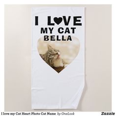 a white towel with a cat's face and the words i love my cat bella on it