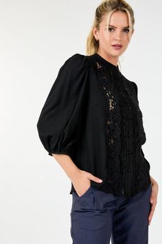 Indulge in the feminine elegance of our Women's 3/4 Lace Crochet Button Down Blouse. Crafted with delicate lace crochet, this top exudes sophistication and grace. The button-down design adds a touch of classic charm. Elevate your wardrobe with this exclusive and timeless piece. This top boasts delicate lace detailing that exudes femininity and refinement while its 3/4 sleeves strike a balance between coverage and freedom of movement. The collarless design lends a modern touch.Additionally the long popcorn sleeves add texture and visual interest elevating the tops overall appeal. - Solid - Round neckline I Collarless - Lace detailing - 3/4 Sleeve I Popcorn Popcorn Sleeves, Crochet Button, Feminine Elegance, Crochet Buttons, Lace Crochet, Button Down Blouse, Handbag Shoes, Plus Size Tops, Timeless Pieces