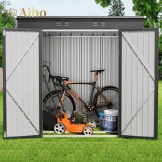 an outdoor storage shed with two bikes in it