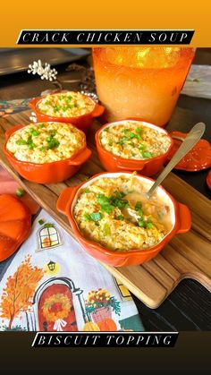 three orange bowls filled with food sitting on top of a wooden cutting board next to an orange pot