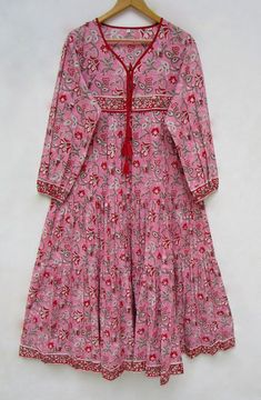 Every Day Dresses Casual, Pink Printed Floor-length Maxi Dress, Pink Bohemian V-neck Maxi Dress, Traditional Pink Embroidered Maxi Dress, Pink Block Print Long Sleeve Dress, Pink Cotton Maxi Dress With Long Sleeves, Pink Bohemian Cotton Dress, Pink Long Sleeve Dress With Block Print, Pink Maxi Dress With Tassels For Vacation