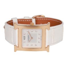 This Heure H small watch is in rose gold plated stainless steel with a diamond-set mother of pearl dial, and an adjustable and interchangeable white matte Chantilly alligator band.The watch features a Swiss quartz movement, white dial with sun pattern, Hermes stamped buckle closure, hour and minute functions, sapphire crystal, and push-pull H engraved crown. Water resistant. Origin: SwitzerlandCondition: New and never Accompanied By: Box and watch box Size: 21mmMeasurements: Watch face: 21mm x 2 Heure H Watch, Sun Pattern, Gold Watches, Small Watch, Rose Gold Watches, Rose Gold White, Gold Ounce, Hermes Bags, Watch Box