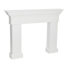 a white fireplace mantel sitting on top of a white floor