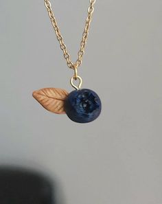 Hello 🤍 This is a necklace with stainless steel chain (in gold colour) and stainless steel components (since 5/4/2023) and a blueberry polymer clay pedant. It is a perfect gift for your loved one 💜 Lenght is 40,6 cm  This piece is elegant and minimalistic 🌟 If you have any questions, feel free to send me a message!✨ Blue Clothes Aesthetic, Elegant Gold Necklace, Cottagecore Jewelry, Necklace Polymer Clay, Crystal Shapes, Gold Colour, Gift For Girlfriend, Steel Jewelry, Stainless Steel Jewelry