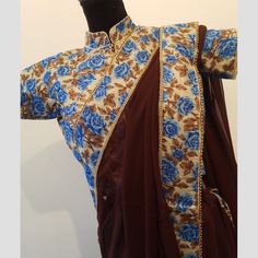 Elegant Brown Saree With Blue Floral Border Comes With Blouse Size Small Brand New Brown Georgette Perfect For Parties And Special Occasions Fitted Blue Georgette Blouse, Blue Floral Print Georgette Blouse Piece, Blue Floral Print Blouse Piece In Georgette, Traditional Blue Georgette Blouse, Designer Floral Print Fitted Blouse, Fitted Blue Blouse Piece With Floral Print, Fitted Floral Print Blouse For Designer Wear, Fitted Blue Floral Print Saree, Festive Blue Blouse With Floral Print