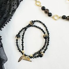 This beautiful double-wrapped bracelet is crafted from the highest quality black obsidian. Its timeless design makes it the perfect choice for adding a touch of elegance and style to any white-colored outfit. It can also be worn as a choker, making it a lovely gift for any birthday or special ceremony. Keep the necklace away from perfumes, lotions, hairsprays, and other chemicals. Black Obsidian, Fashion Jewellery, Independent Designers Fashion, Badger, Lovely Gift, Chemicals, Designer Fashion, Timeless Design, Choker