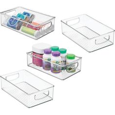 three clear storage bins filled with various items