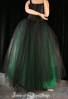 "Bridal Style tutu tulle skirt floor length! Made from 65+yards, five layers of soft smooth two black layers on top of three green layers on bottom Bridal tulle, all layers have been gathered and serged to the soft black fabric covered elastic waistband. This skirt is not made yet, It is made when ordered! Measurement: Sizes go by smallest waist size tutu will fit to largest Hips tutu fits over XSmall 24\"-34\"inches Small 26\"-38\"inches Medium 30\"-40\"inches Large 34\"-48\"inches XLarge 38\"- Tulle Crinoline Skirt For Costume Party, Crinoline Tulle Skirt For Costume Party, Black Tiered Skirt Dress For Wedding, Black Tiered Skirt Wedding Dress, Black Tulle Dress With Voluminous Skirt, Black Tiered Skirt In Crinoline, Black Crinoline Full Skirt Petticoat, Black Full Skirt Crinoline Petticoat, Black Tulle Skirt For Costume Party