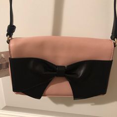 Brand New With Tags On! Pink Leather With Black Bow And Black Cross Body Strap. Dust Bag Included. Chic Kate Spade Shoulder Bag For Spring, Kate Spade Spring Evening Shoulder Bag, Kate Spade Evening Shoulder Bag For Spring, Kate Spade Shoulder Bag With Adjustable Strap For Spring, Chic Kate Spade Bags For Spring, Chic Kate Spade Party Bags, Trendy Kate Spade Evening Shoulder Bag, Trendy Kate Spade Bag For Evening, Trendy Evening Kate Spade Shoulder Bag