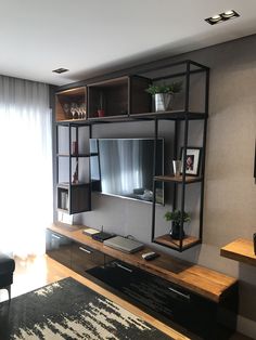 a living room with a large entertainment center