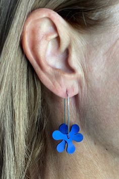 Material: colored anodized aluminum and stainless steel. Description: Bronwen Riddiford and Robert Foster have created two new designs for hanging earrings: The first design is called ‘Propeller’ and is based on a symmetrical three pointed shape and the element of movement where two pieces spin on the hanging axis and the surface finish differentiates the two. ‘Flip’ the second design is also based on the symmetry of three equal points but the design has been ‘folded’ to resemble petals or a fan. Both simple and elegant, they are light to wear and have an endearing sense of humor previously captured by Bronwen in her Fink ‘Wine Chiller’ design. Variations in the shapes for both concepts mean the entire range consists of six individual styles (flat, pointed and curved in both Propeller and Home Decor Sale, Linen Tea Towel, Wine Chiller, Colorful Jewelry, Fabric Sale, Hanging Earrings, Anodized Aluminum, Earrings Blue, Cold Weather Accessories