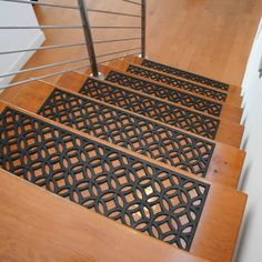 the stair treads are designed to look like they have been made from wood and metal