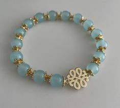 To celebrate my recent shop opening, customers can use promo code: FIRST50 for 50% off on the first 5 orders this shop receives! Handmade with love, beaded bracelets Using glass beads, 18K gold plated bead brackets and double-looped elastic. Length slightly varies depending on the bead bracket (metal part that encases the bead), however they are all around 5.3cm in diameter.  Due to the elasticity, they can stretch but these can be made to order so please add the size you would like in the order Cheap Blue Beaded Bracelets With Gold Beads, Round Beads Bracelets For Birthday Gift, Birthday Bracelets With Round Beads, Round Beaded Bracelet For Birthday Gift, Birthday Gift Round Bead Bracelets, Elegant Beaded Bracelets With Letter Beads For Jewelry Making, Elegant Beaded Bracelets With Letter Beads As Gift, Elegant Beaded Bracelets With Letter Beads For Gift, Adjustable Bracelets With Round Beads As Gift