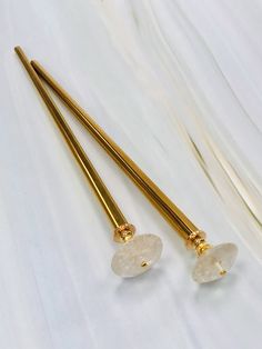 Large genuine Rock Crystal gems adorn the ends of these hair sticks. Finished with gold fill bad caps . These would make beautiful bridal hair sticks. Shown on our gold colored metal hair sticks with a 5" functional length these hair sticks are a good size for most hair types. Need a different size? These metal hairsticks can be crafted shorter or longer to your request as a special order. May also be used as a sweater / shawl pin. Can also be ordered in silver, and gold. Our metal hair sticks a Tiger Eye Hair, Rock Crystal Jewelry, Gemstone Hair, Beautiful Bridal Hair, Silver Hair Pin, Sweater Shawl, Gold Hair Pin, Shawl Pin, Bridal Hair Jewelry