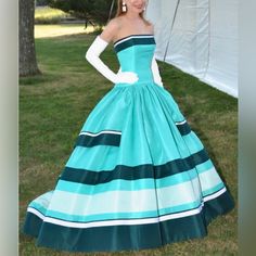 Store Display Dress, Good Condition, Has Marks And Faded Spots Shown In Pictures. Size:Us 2 Measurements: Bust: 30" (77cm) Waist: 25" (63cm) Note: Fabric Tag Removed From The Spring 2019 Collection. Turquoise, Seafoam And Multicolor Carolina Herrera Sleeveless Gown With Striped Pattern Throughout, Square Neck, Pleated Accents At Waist, Overlay At Side, Structured Mesh Lining At Interior And Concealed Zip Closure At Back. Turquoise Gown, Carolina Herrera Dresses, Sleeveless Gown, Fabric Tags, Store Display, Carolina Herrera, Square Neck, Blue And White, Maxi Dress