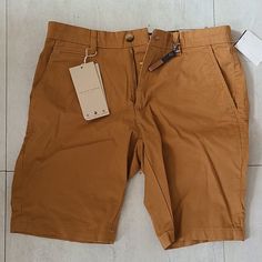 Nwt Denim & Flower Tan Shorts Size 29/36 Brown Cotton Shorts For Spring, Brown Jean Shorts For Spring, Spring Brown Jean Shorts, Fitted Brown Cotton Shorts, Casual Brown Mid-rise Shorts, Brown Jean Shorts With Pockets For Summer, Flower Orange, Tan Shorts, Denim Flowers