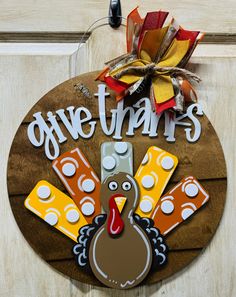 a sign that says give thanks with a turkey on it