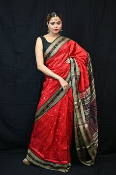 Exclusive hand-woven Bomkai silk saree with hazar (1000) buti pattern. This is a double Ikat saree from Odisha handloom. Finest pure handwoven sambalpuri ikat silk saree with traditional motifs woven by the master weavers of Sambalpur, Odisha. It has lovely patterns and is world-famous for its stunning colours, texture and designs. Specification:  Occasion: Festive Wear Fabric: Tussar Silk Primary Color: Red Secondary Color:Black Material : Tussar Pattern: Buti Border Type: Ikkat Border Size: Medium Blouse Piece: Included Care: Dry Clean Disclaimer : This is a genuine handwoven piece, & that could expect unevenness in the selvedge and weave, and colours may fade or bleed due to the traditional dyeing method employed. Saree's fall & edging will be done complimentary for all international or Festival Slub Silk Pre-draped Saree With Weaving Work, Raw Silk Saree With Weaving Work For Rituals, Slub Silk Saree With Cutdana For Rituals, Festive Tussar Silk Pre-draped Saree For Rituals, Rituals Raw Silk Saree With Weaving Work, Slub Silk Saree With Zari Weaving For Rituals, Ceremonial Tussar Silk Saree, Slub Silk Saree For Rituals, Tussar Silk Anarkali Saree For Rituals