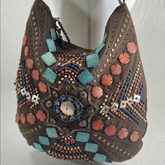 Thank You For Clicking Our Charm Luck Brown Canvas Western Shoulder Slouch Bag Purse Turquoise Beaded New New, Unused Canvas Slouch Bag With Lots Of Western Style And Flair! The Seed Bead, Applied Stone And Metal Stud Work Is So Eye-Catching And Unique! Think Yellowstone! -Braided Real Leather Strap -Wonderfully Intricate Bead, Stone And Stud Work -Dual Zipper Closure With Charm And Luck Spell-Out Metal Pulls. -Such A Pretty Pink Inside Lining With Zipper Pocket And Double Credit Card Slip Pocke Bohemian Beaded Tote Shoulder Bag, Beaded Brown Shoulder Bag For Travel, Travel Brown Beaded Shoulder Bag, Beach Embellished Rectangular Shoulder Bag, Embellished Rectangular Shoulder Bag For Beach, Rectangular Embellished Beach Shoulder Bag, Bohemian Beaded Shoulder Bag For Vacation, Bohemian Embellished Bags For Vacation, Beach Rectangular Embellished Shoulder Bag