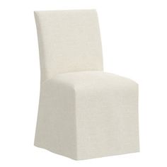 a white chair that is upholstered with fabric on the seat and back side