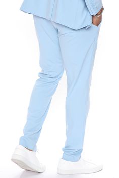 Model Height: 6'2 Large - Waste size 34 Big & Tall: Height 6'3 - Waist Size 42 Available In Light Blue. Button Closure Zip Fly Side Hand Pockets Back Pockets Slim Fit Shell: 65% Polyester 33% Viscose 2% Elastane Lining: 100% Polyester Inseam is 33 , can be tailored Pair with The Modern Stretch Suit Jacket Imported | Mens The Modern Stretch Slim Trouser in Light Blue size 42 by Fashion Nova Stretch Blue Bottoms With Button Closure, Blue Stretch Bottoms With Button Closure, Blue Tapered Leg Bottoms With Button Closure, Blue Tapered Leg Pants With Button Closure, Blue Chinos For Spring Workwear, Spring Blue Chinos For Workwear, Spring Workwear Blue Chinos, Slim Trousers, Trouser Suits