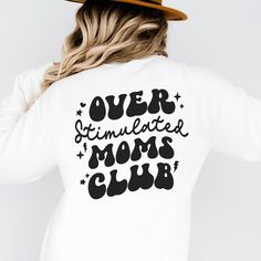 The Overstimulated Moms Club Sweatshirt is a cozy and stylish addition to any mom's wardrobe. This sweatshirt is perfect for the busy and overworked mom who needs some comfort in her daily life. The sweatshirt comes in a retro style, featuring a back print. ♥ We want you to be happy with your item, and for it to bring you joy! If you have any problems with your order or your item, please contact us prior to leaving a review. We will do what we can to take care of you and ensure that you are a ha Mother's Day Relaxed Fit Sweatshirt For Loungewear, Relaxed Fit Sweatshirt For Mother's Day Loungewear, Casual Sweatshirt For Mother's Day Loungewear, Mom Wardrobe, Tired Mom, Club Sweatshirts, Moms Club, Club Shirts, To Be Happy